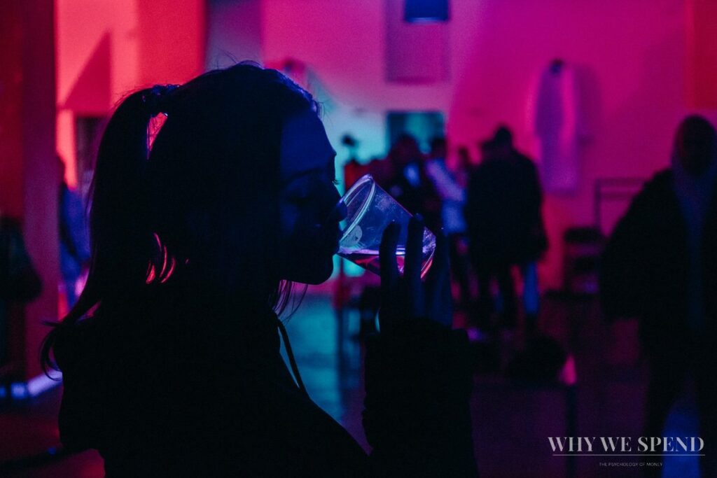 Woman alone at social event — performance spending anxiety