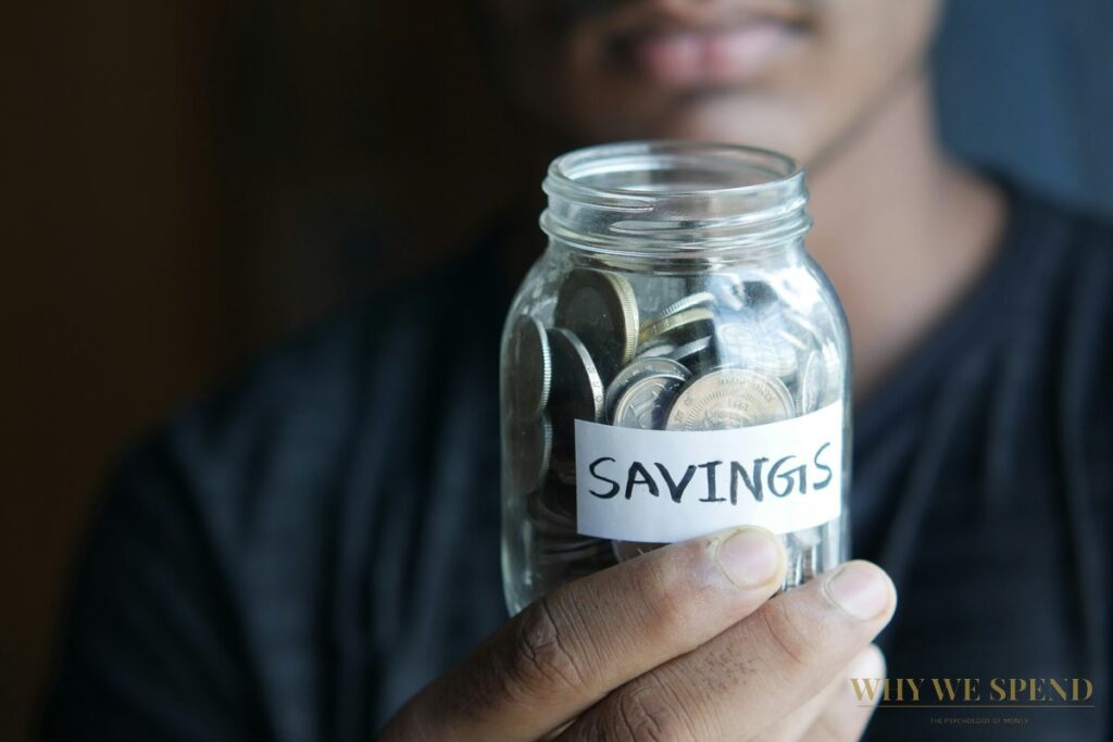 Savings jar with coins — building a salary arrival savings habit