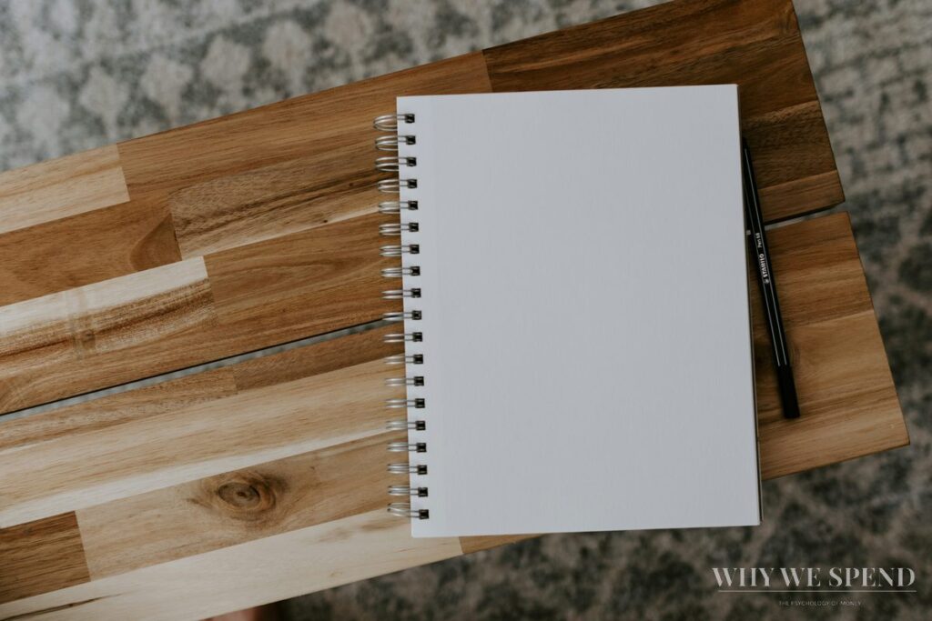 Blank notebook and pen — planning personal spending boundaries