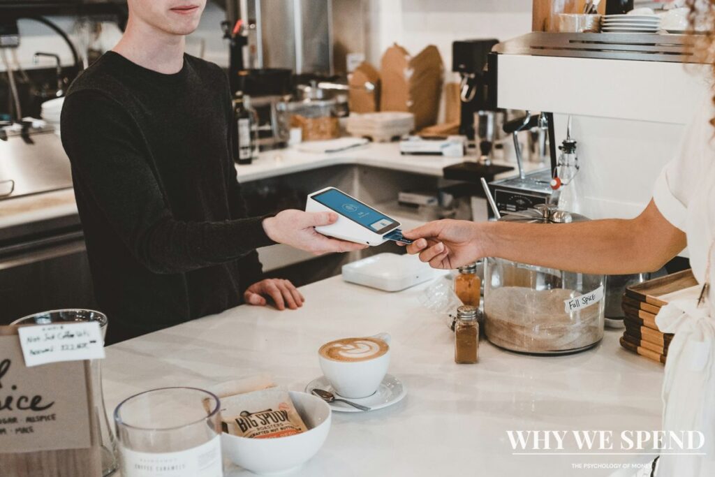 Restaurant bill and payment on table representing group spending psychology