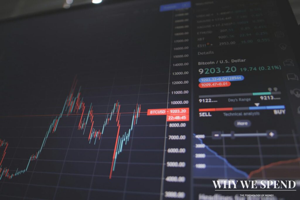Stock market charts and financial news headlines on screens