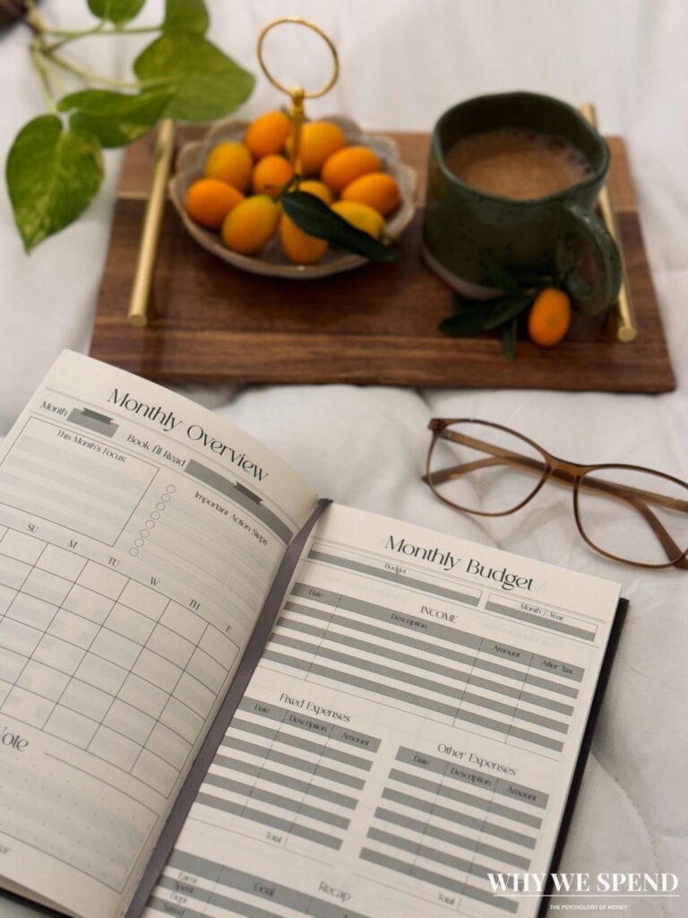 Person calmly reviewing budget and financial commitments in organised notebook
