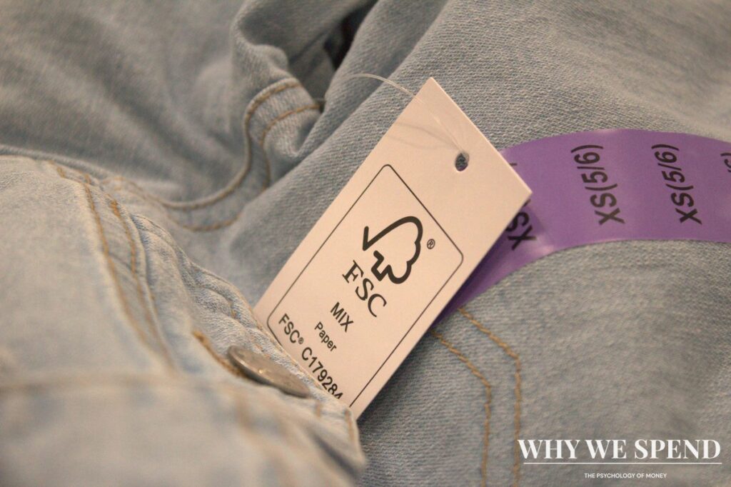 Unworn clothes with tags still attached in shopping bags