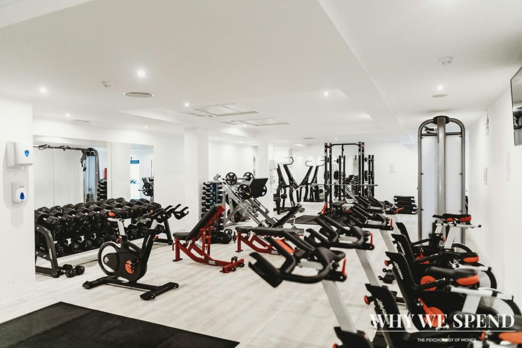 Empty gym with unused equipment representing wasted membership fees