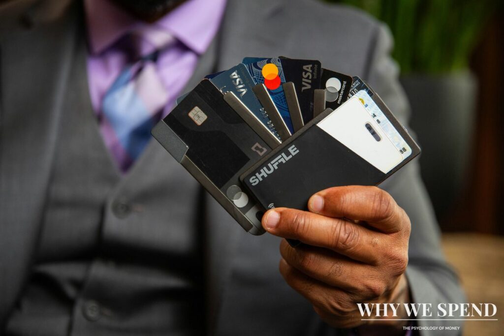 Multiple credit cards spread out representing mounting debt and overspending