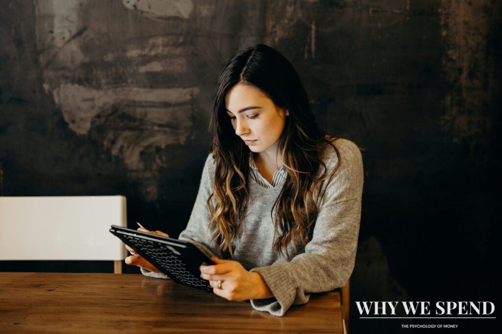 Person reading on digital tablet in clean uncluttered space