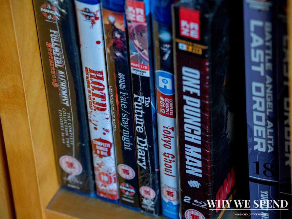 Unopened physical video games displayed on shelf still in shrink wrap