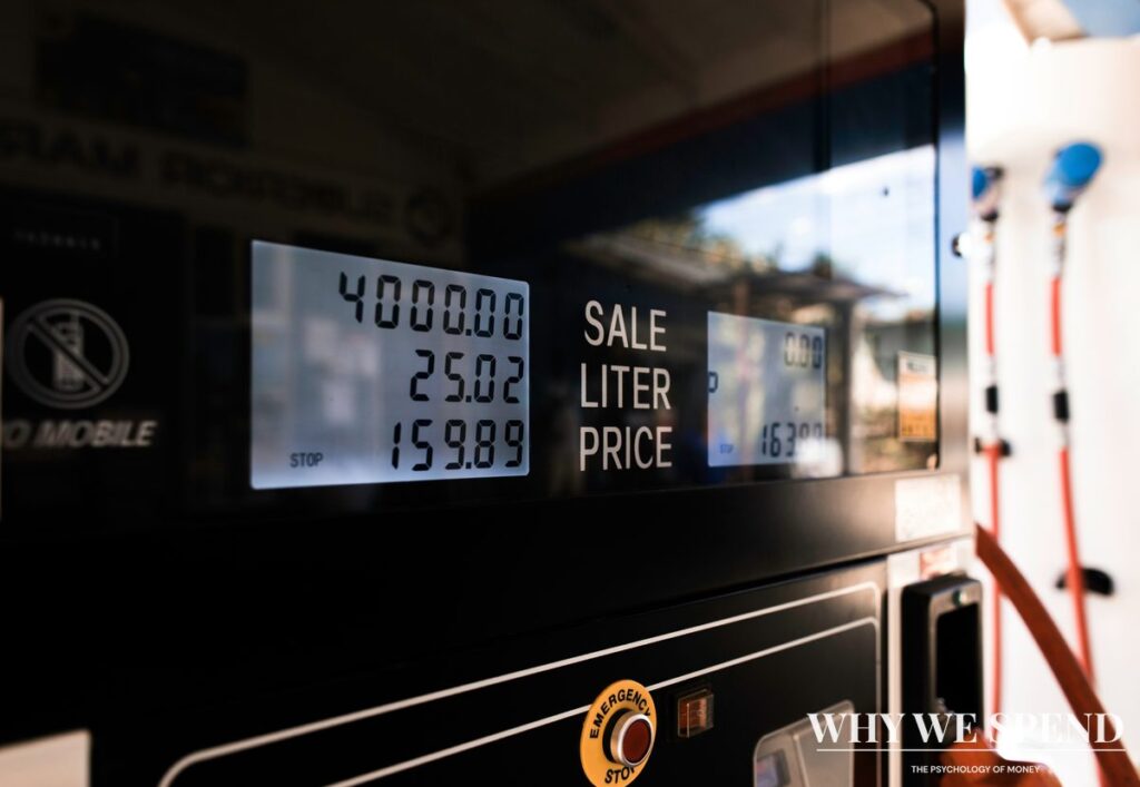 Petrol pump display showing rising fuel prices at gas station