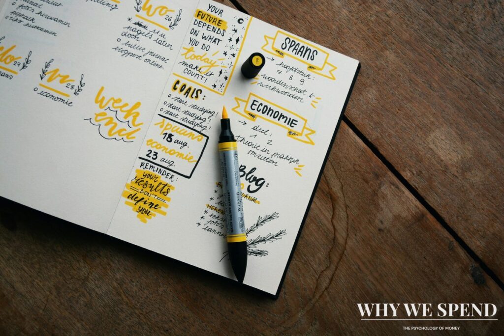 Budget planning notebook with financial calculations and notes