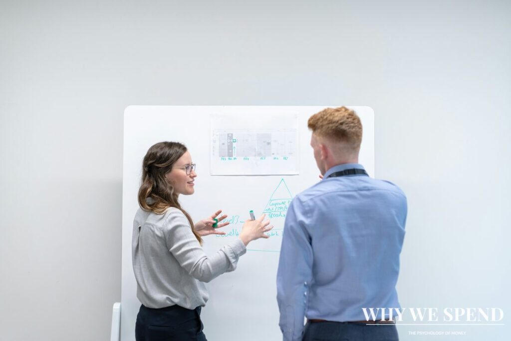 Business professionals analysing property investment data and charts