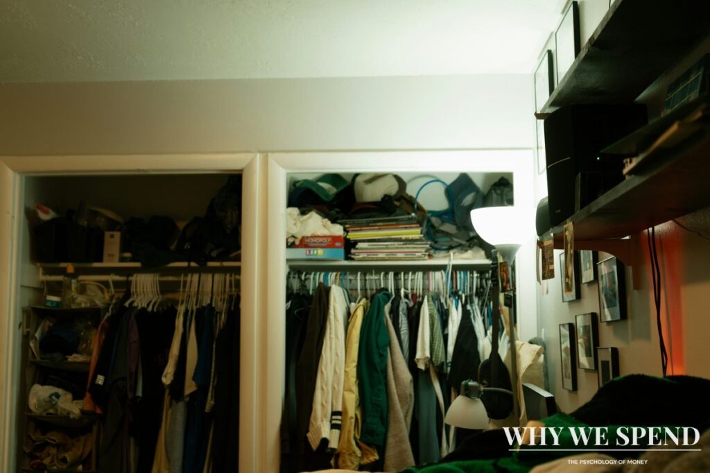 Overstuffed wardrobe with unworn clothes and tags