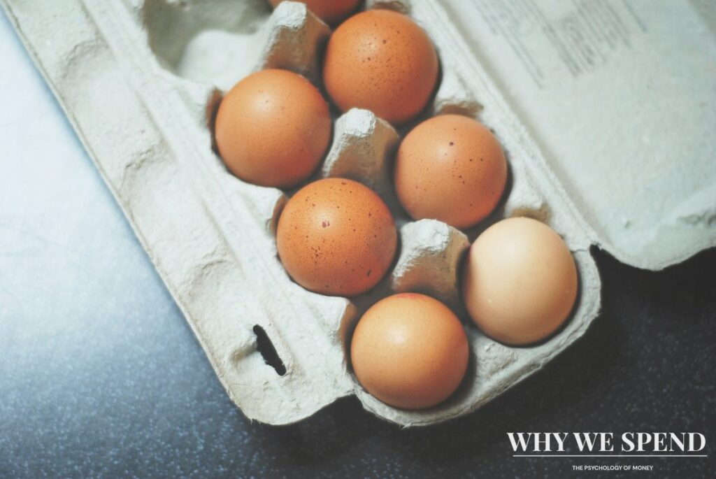 Premium organic eggs displayed next to regular eggs in store