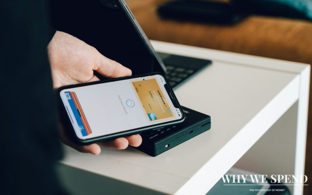 Young Asian professional using smartphone for mobile payment