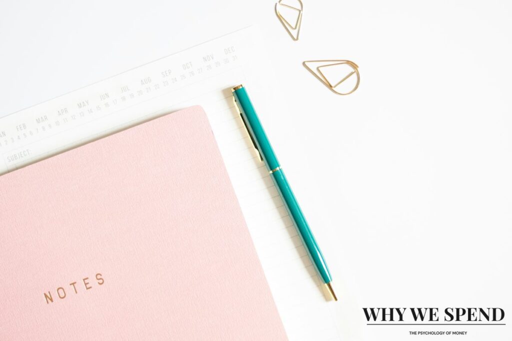 Organised financial planning notebook with calm workspace setup