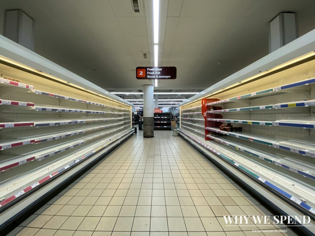 Empty supermarket shelves showing impact of panic buying behaviour