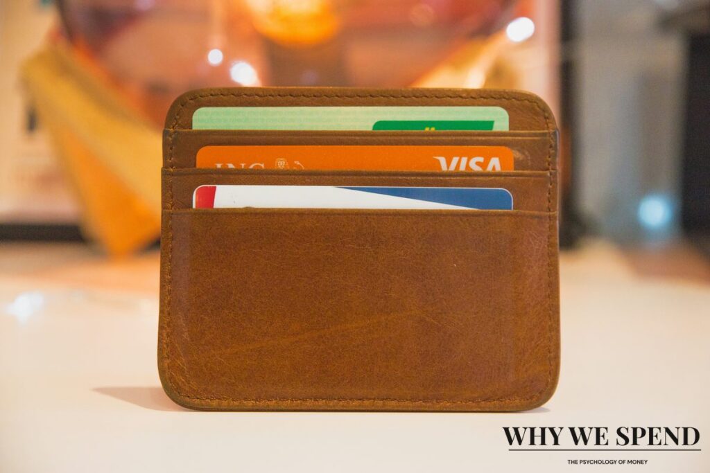 Empty wallet and credit cards showing financial impact of overspending