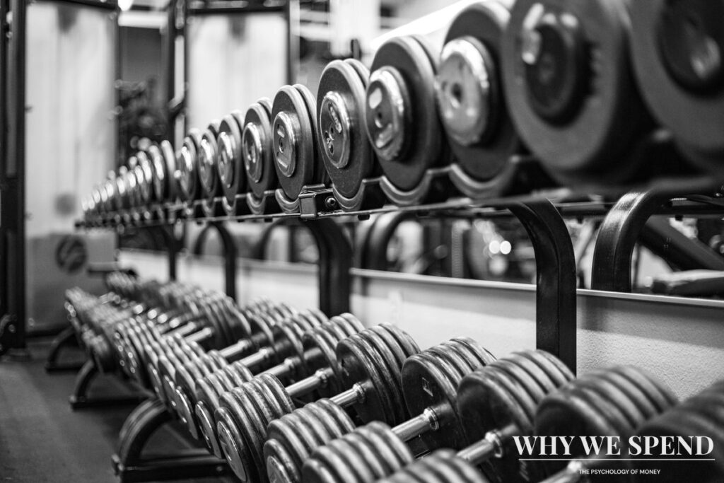 Empty gym interior with unused exercise equipment