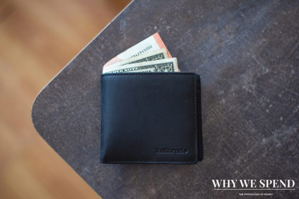 Closed wallet symbolising the wartime wallet reflex during distant conflicts