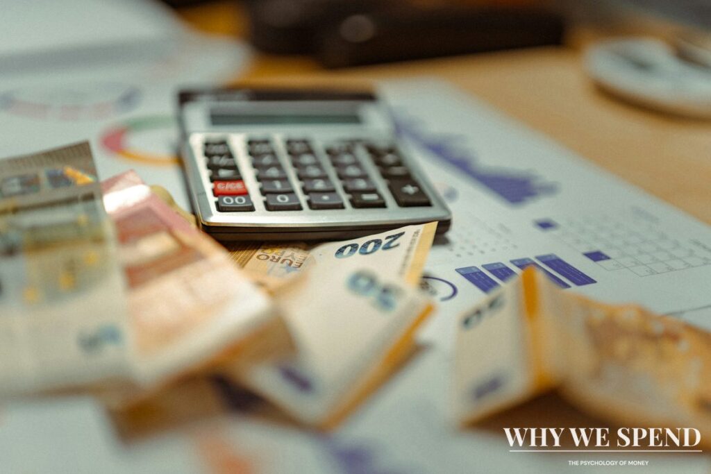 Person calculating bills and expenses showing financial stress and decision-making