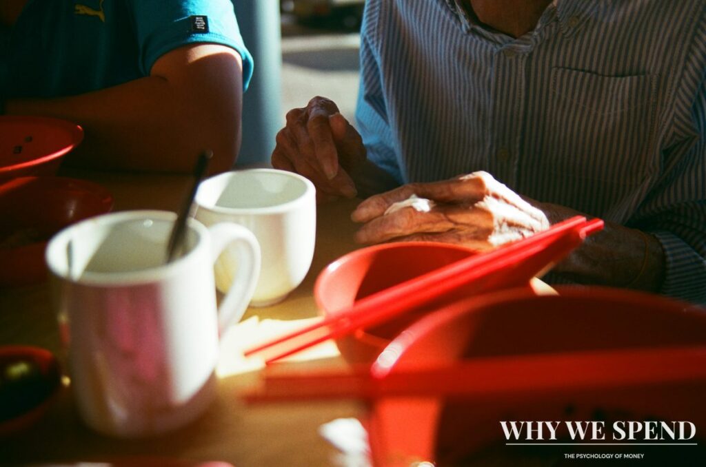 People having conversations at a traditional kopitiam representing social lottery culture