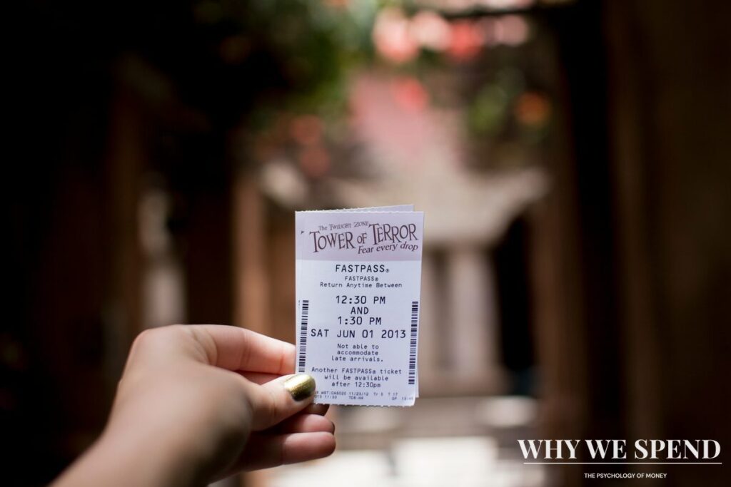 Person holding lottery tickets with stressed expression showing entitlement to sudden wealth