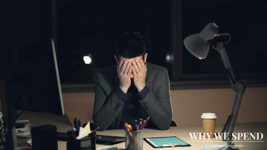 Person experiencing financial stress and anxiety over bills