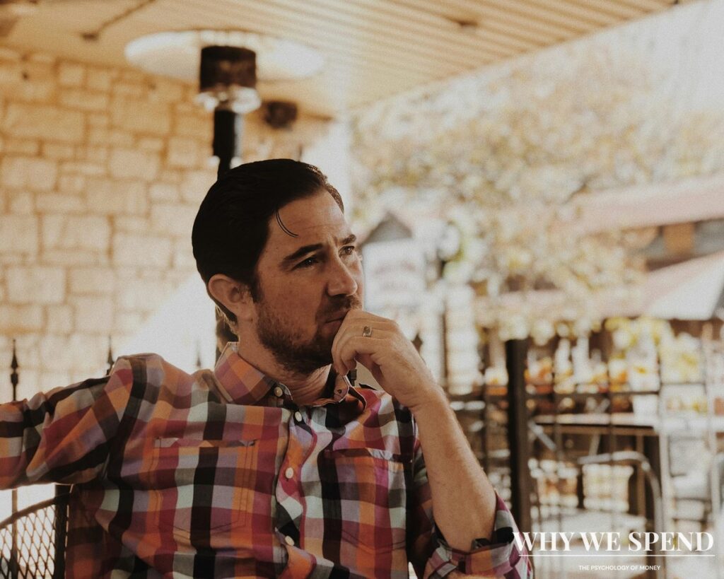 Person contemplating purchase decision and spending behaviour