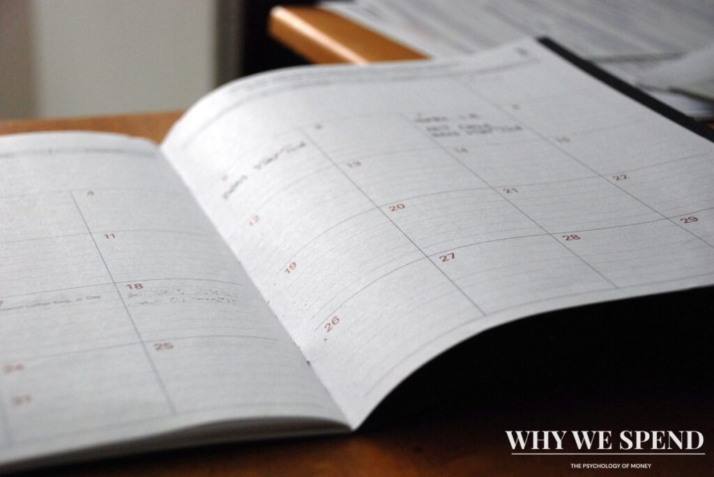 Organised planner and notebook showing financial planning system