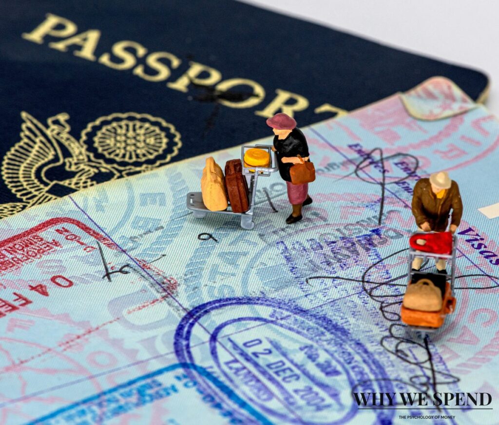 Multiple passports and travel documents spread across a desk representing backup plans